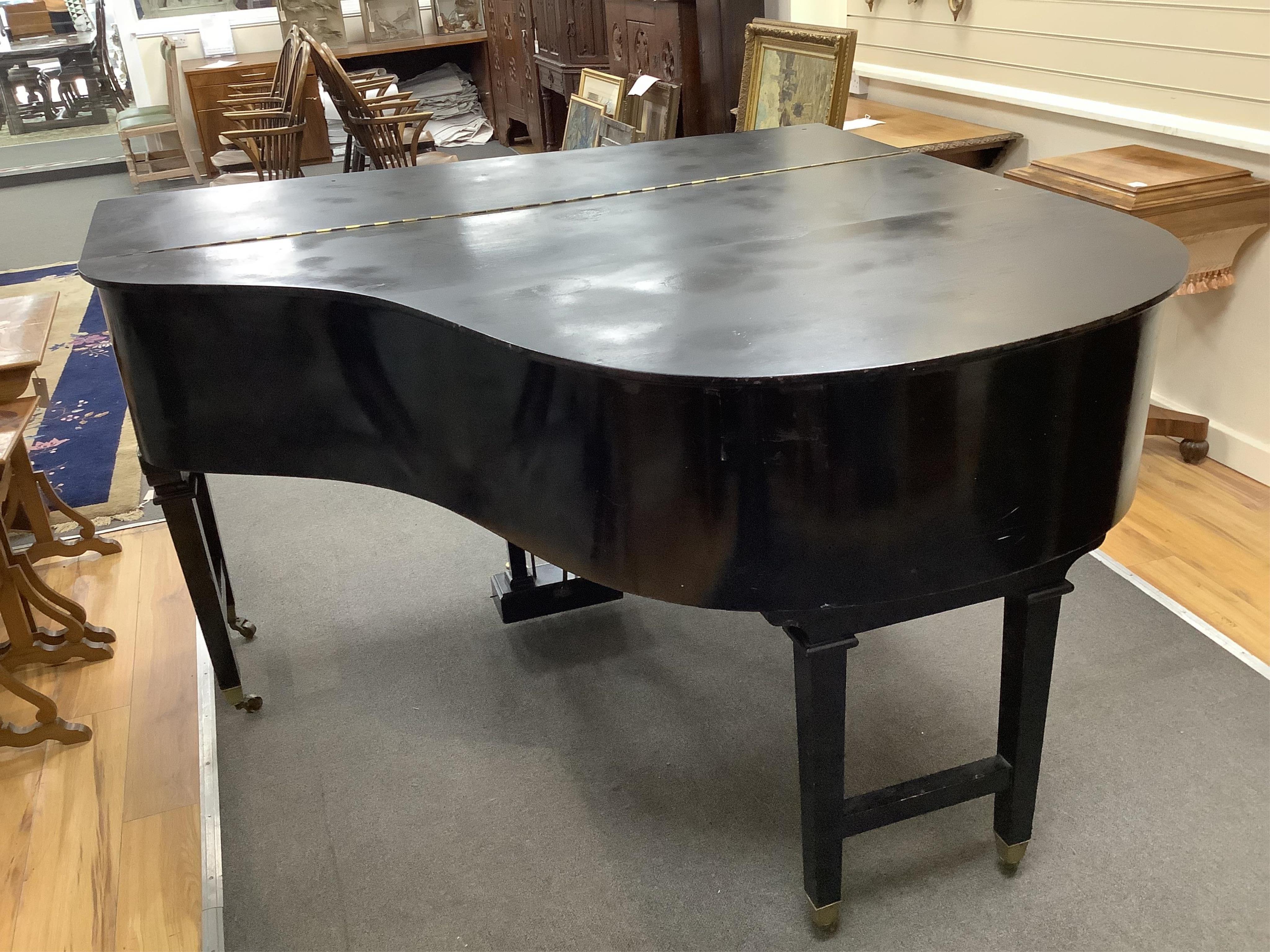 An early 20th century Schumann ebonised boudoir grand piano, length 154cm, width 156cm, height 100cm. Condition - poor